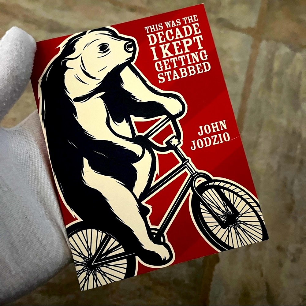 Book: By John Jodzio. "This was the Decade I Kept Getting Stabbed"54 pages. NWT